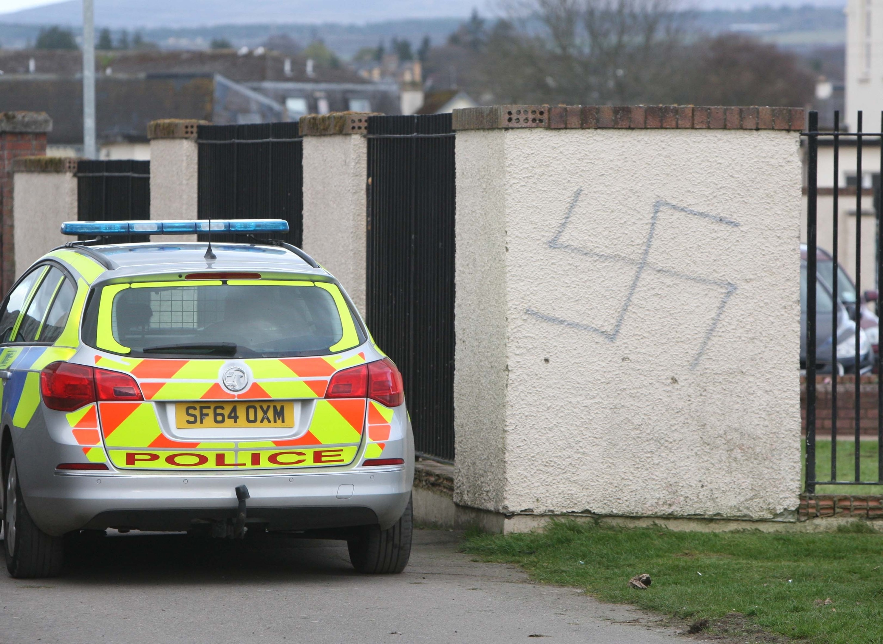 Swastikas have been painted on walls and garage doors in the Muirtown Basin area of Inverness. Picture by Andrew Smith