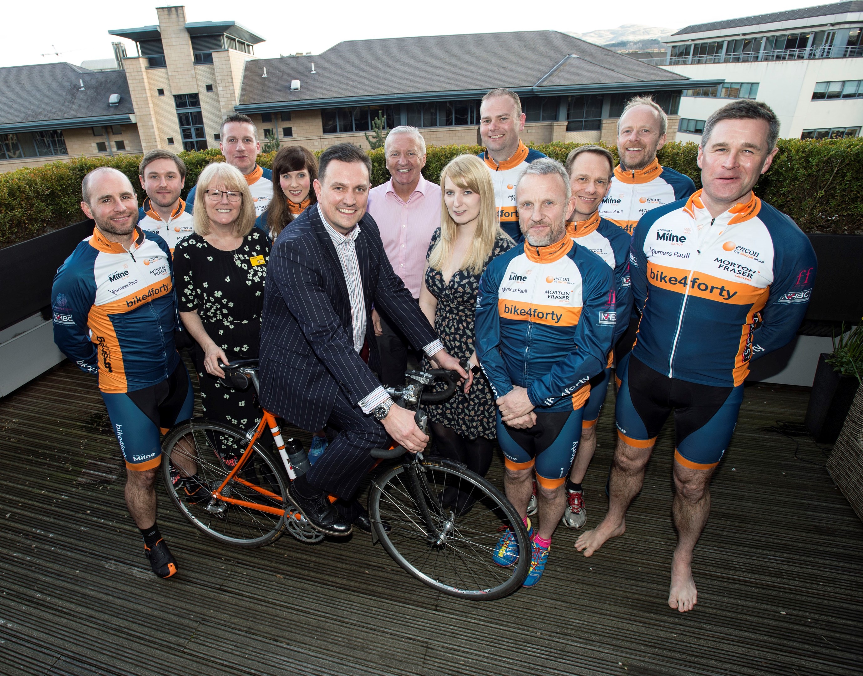 The STewart Milne team have raised more than £40,000 for charity
