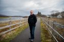 Councillor Brian Murphy at the proposed site of the Caol link road
