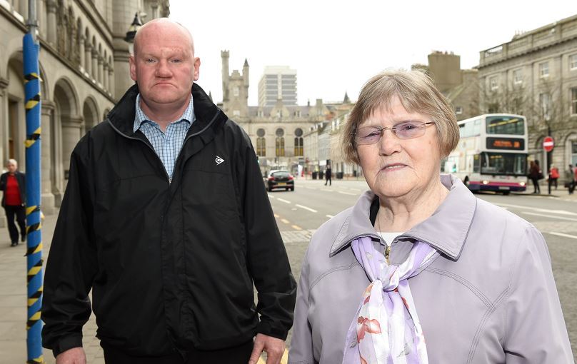 Kevin Watt with his mother outside Aberdeen Court. Joyce was stalked by Mark Mickowski.