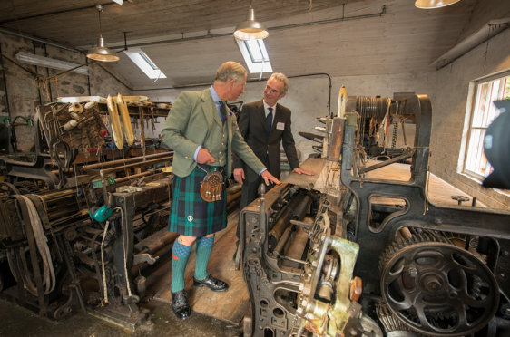 Prince Charles visiting the mill in 2012