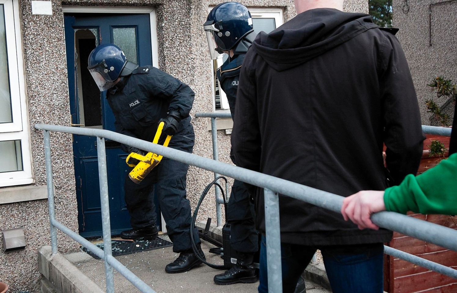 Police in Elgin have carried out a series of raids on houses in the area