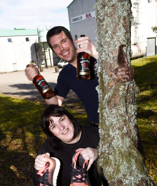 Miranda Murdoch and Gareth Morgan, distillery manager, at Tamnavulin Distillery promoting the 7 Stills Fun Run which will take place during the Speyside Whisky festival.