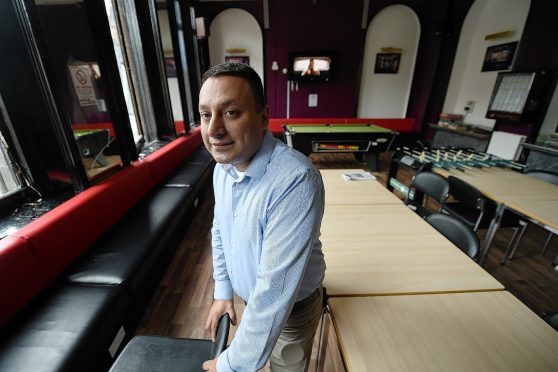 Ali Mohamed at his hostel in Inverness city centre