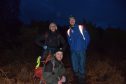 Pictured (L-R): Volunteer wolf pack Dora Clouttick, James Robertson and Matt McMullen at Dundreggan Conservation Estate