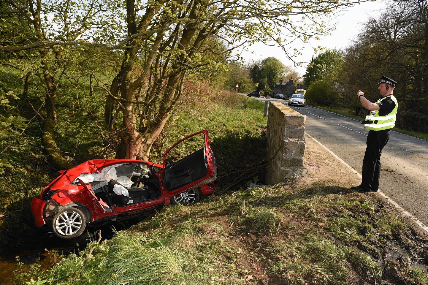 The car tumbled off the road and down an embankment 