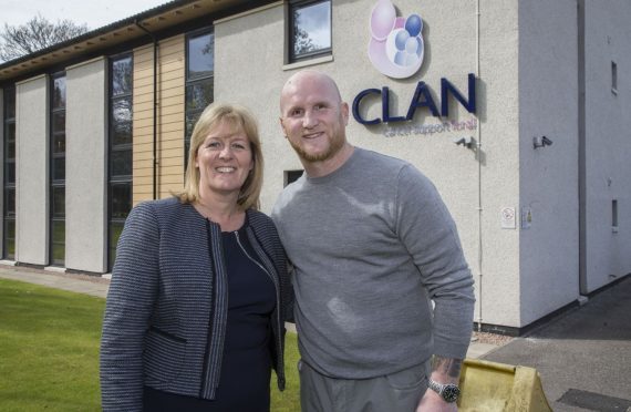 Dr Colette Backwell, chief executive of CLAN Cancer Support with John Hartson