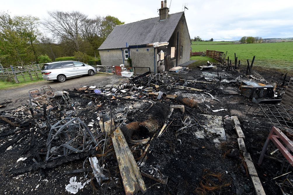 The fire at Gary Simpson's Ellon cottage. Picture: Kenny Elrick.