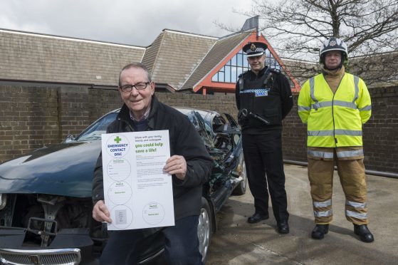 Councillor Ron McKail with Inspector Colin Taylor and SFRS station manager Willie Chrisholm