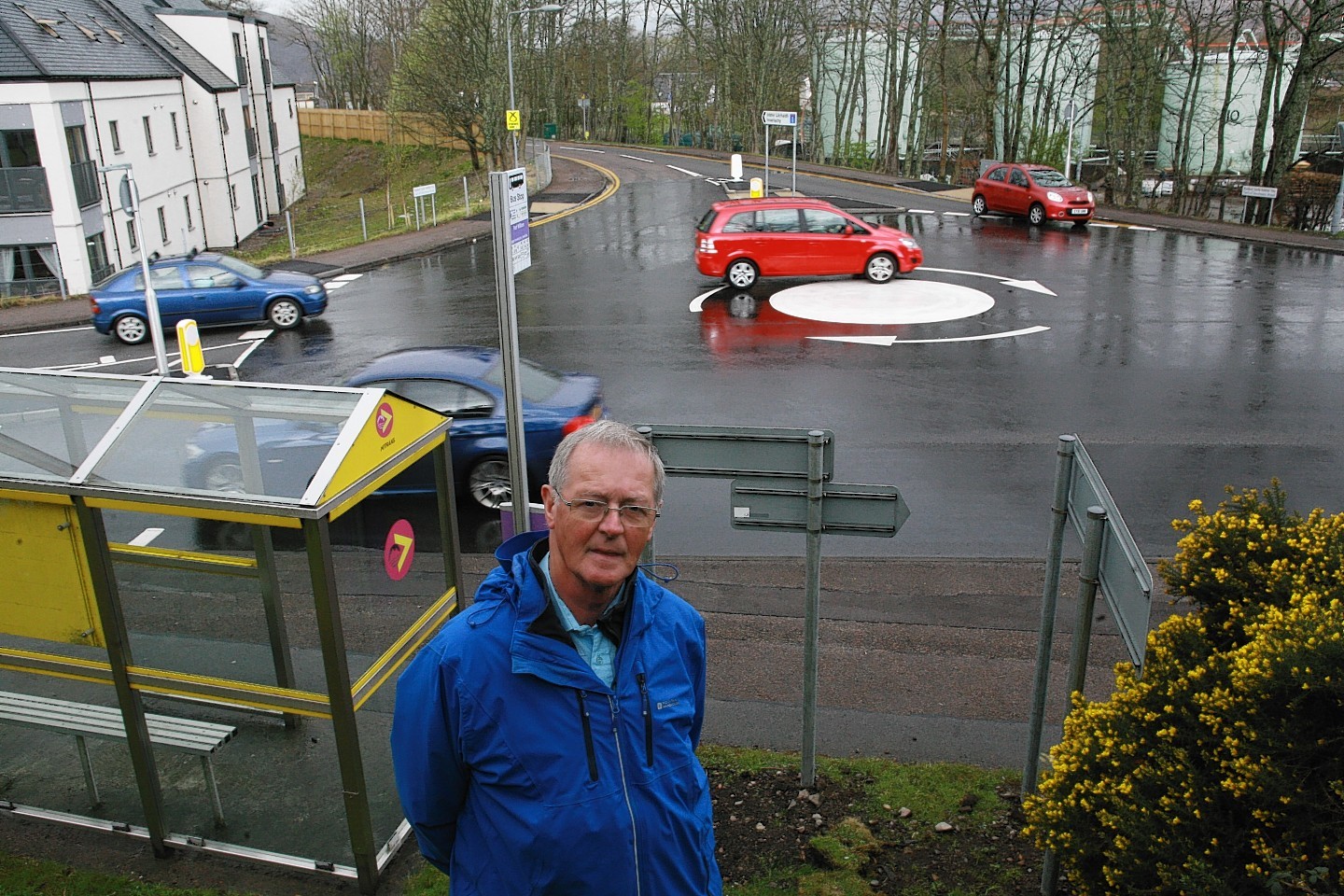 Councillor Allan Henderson at the new mini-roundabout on the A82 in Fort William