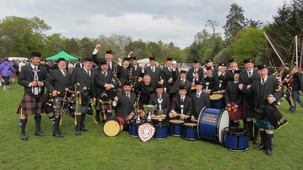 City of Inverness Pipe Band celebrate their wins at Banchory