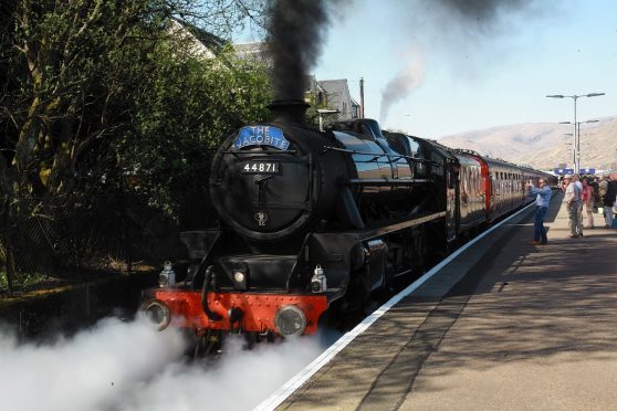 The Jacobite steam train leaves Fort William for Mallaig