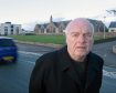Jim McGillivray outside the secondary and primary schools in Dornoch, near to where the 30mph will be extended
