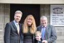 Gregg and Kathryn Brain, with their seven-year-old son Lachlan and Highland MP Ian Blackford