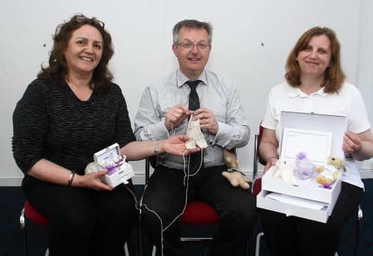 Brendan O'Hara MP with Susan Simpson of SiMBA (right) and Joy Cameron at the event in Oban on Saturday