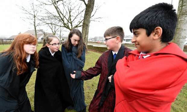 Pupils played out the first act of Macbeth. Pupils Talie Gordon, Kayla Sinclair, Zoe Williamson (Witches) Nathan Landbor (Macbeth) and Adam Shafi (Banquo)