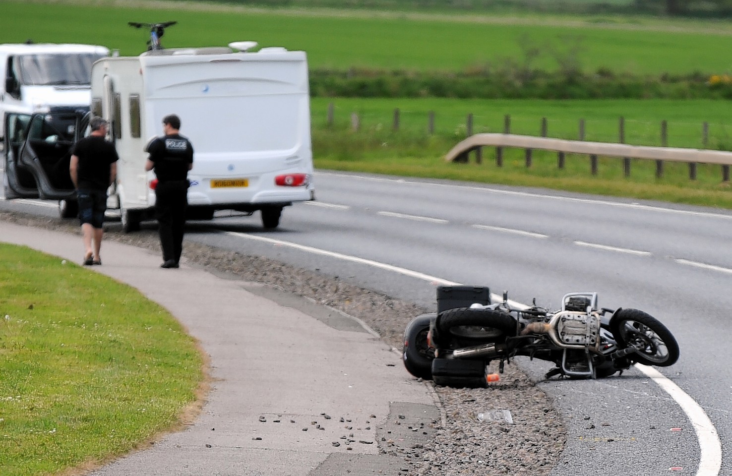 Police a the scene of the crash on the A96