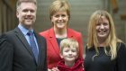 First Minister Nicola Sturgeon with Gregg and Kathryn Brain and their son Lachlan