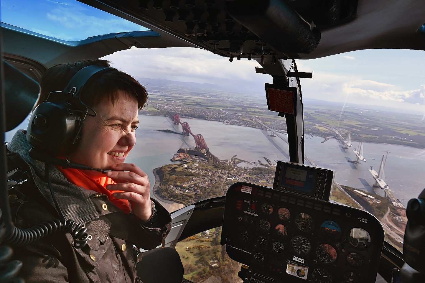 Ms Davidson looks out of her helicopter window