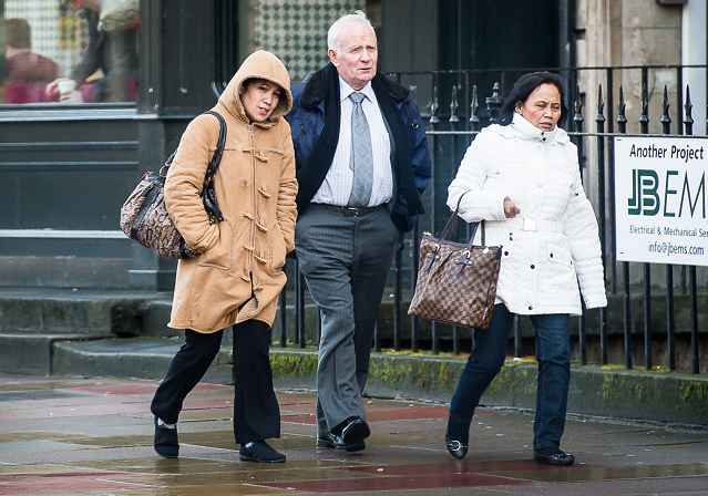 Clarisa Bartolome, left, and family members at the hearing in Edinburgh in February