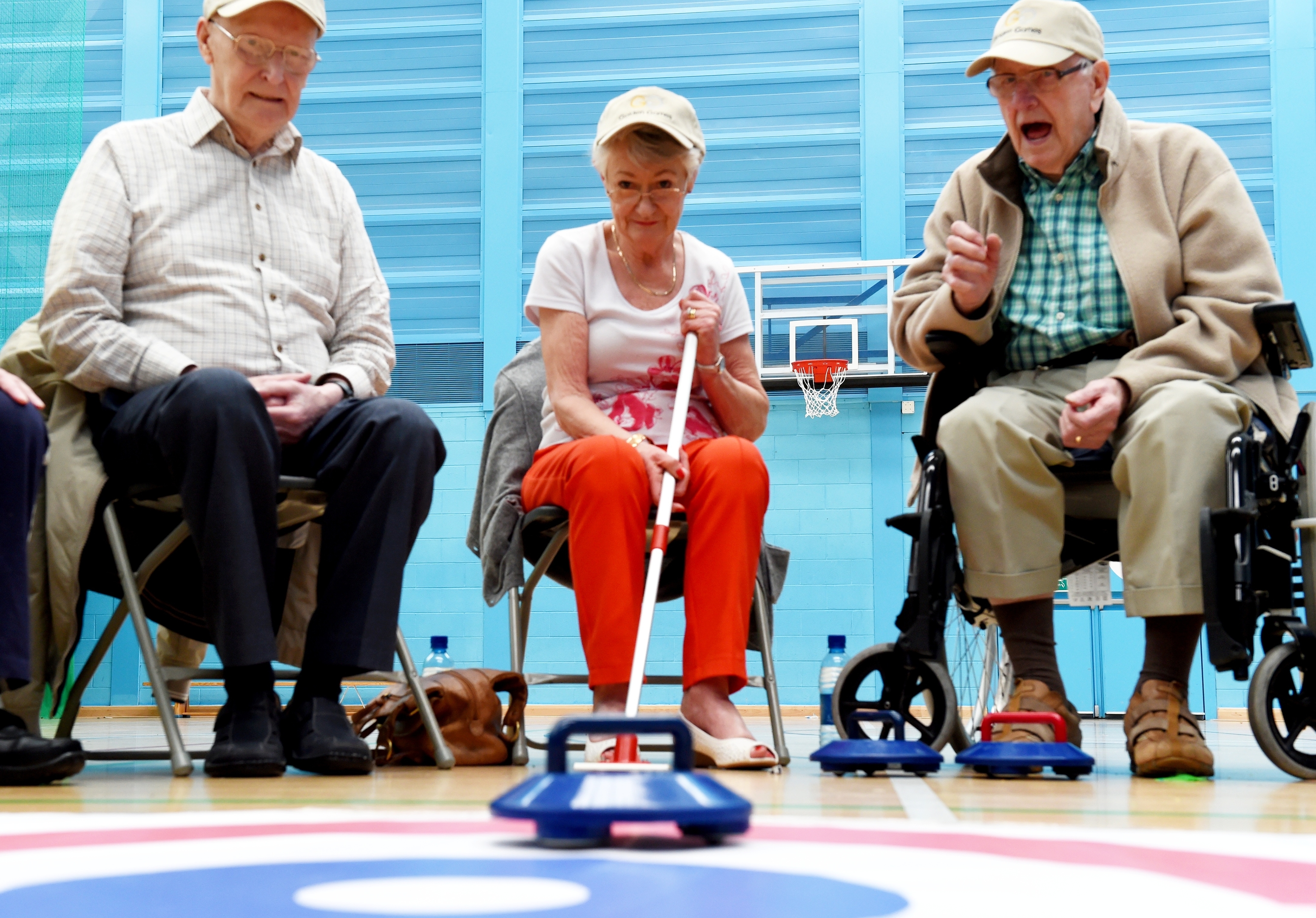 Jimmy Riach, Mary Mitchell and Sandy Courtman compete in the 2016 Golden Games curling. Picture by Colin Rennie