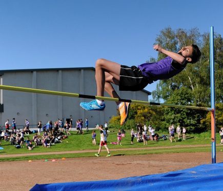 Robbie Macgregor, Gordonstoun, competes in the high jump. Picture by Gordon Lennox