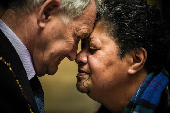 Ms Hema Temara and Alan Wright, Convenor of Moray Council, perform a hongi following a ceremony at the Falconer Museum in Forres