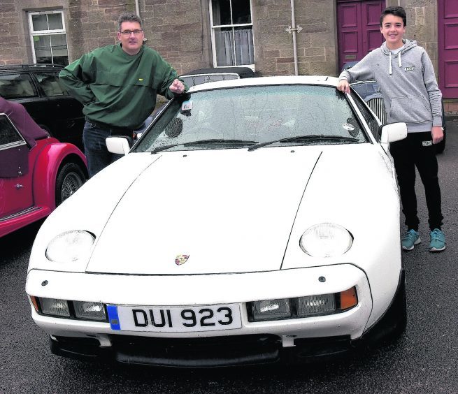 Martin Waugh (left) with his son Aaron and his Porsche 928S