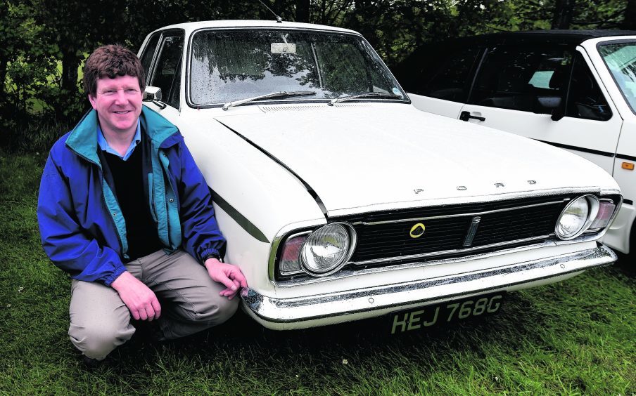 Harry Duncan, Inverurie, with his Lotus Cortina.
