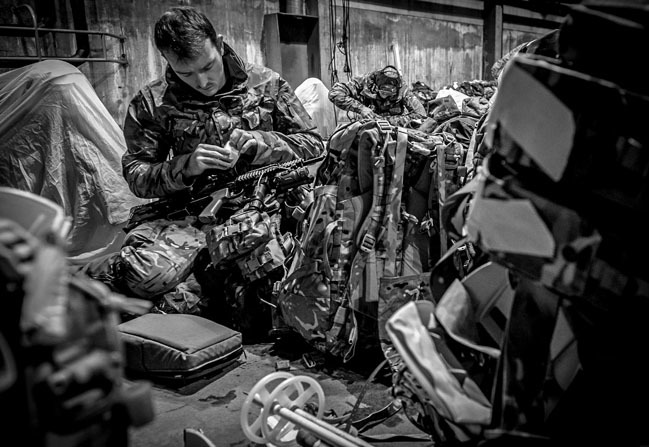 The Commandant General Royal Marines' Prize: Royal Navy Mobile News Team. Royal Marines prepping their kit in the hangar for the final week in the field on Exercise Response.