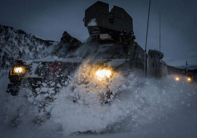 The Commandant General Royal Marines' Prize: Royal Navy Mobile News Team. Royal Marine Vikings Vehicles plough through the snow on training area in Harstag Norway.