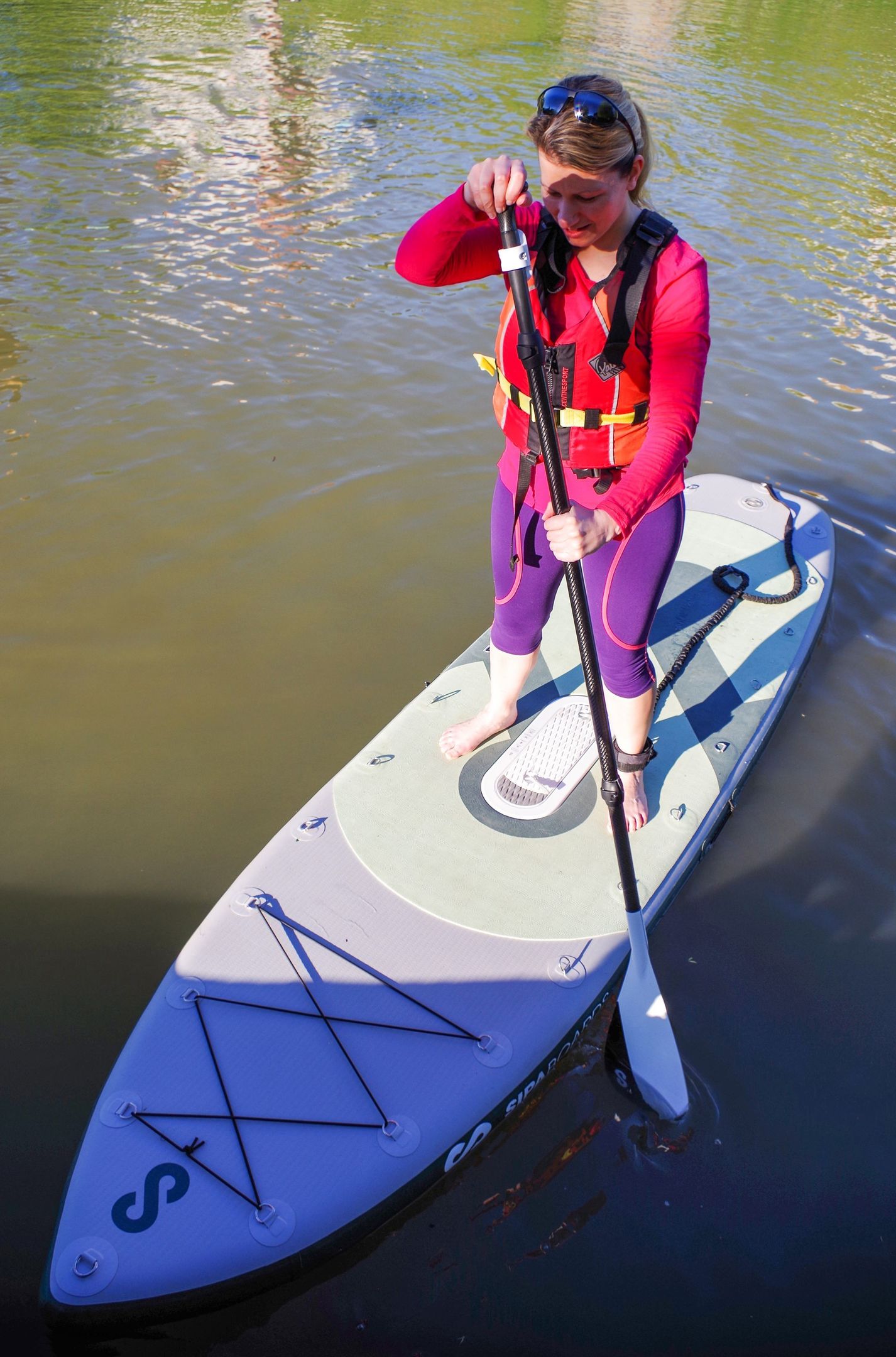 Abi Jackson getting to grips with her paddle board