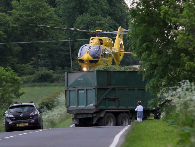 The air ambulance arrives at the scene of the crash.