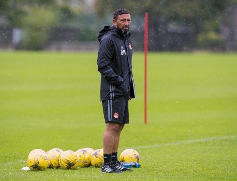 Dons manager Derek Mcinnes watched his side beat Brechin