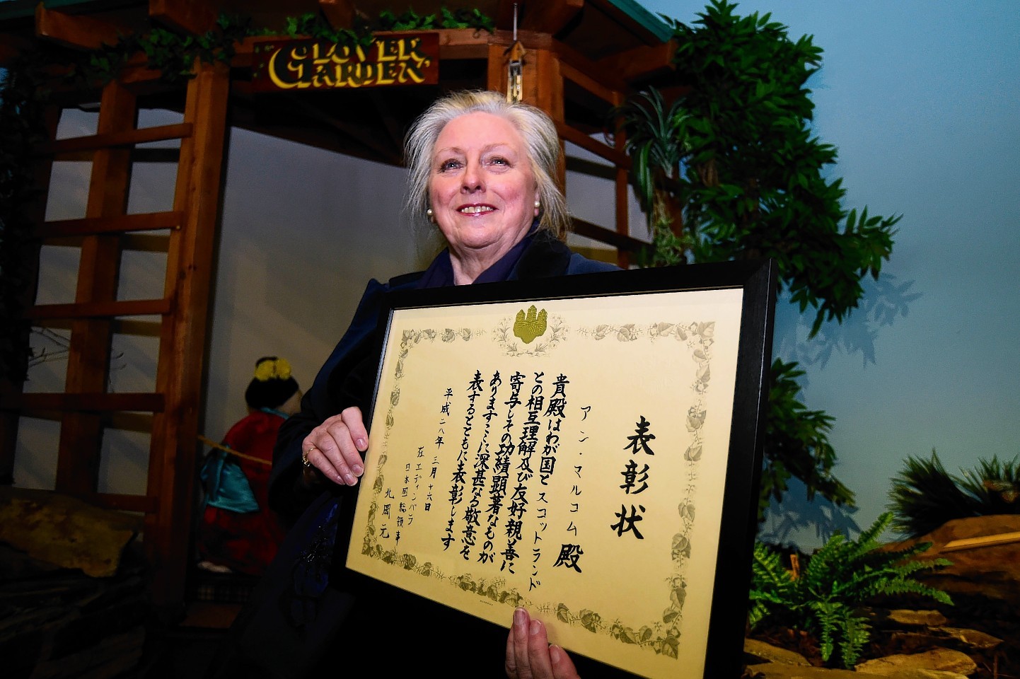 Ann Malcolm with her certificate from the Japanese government