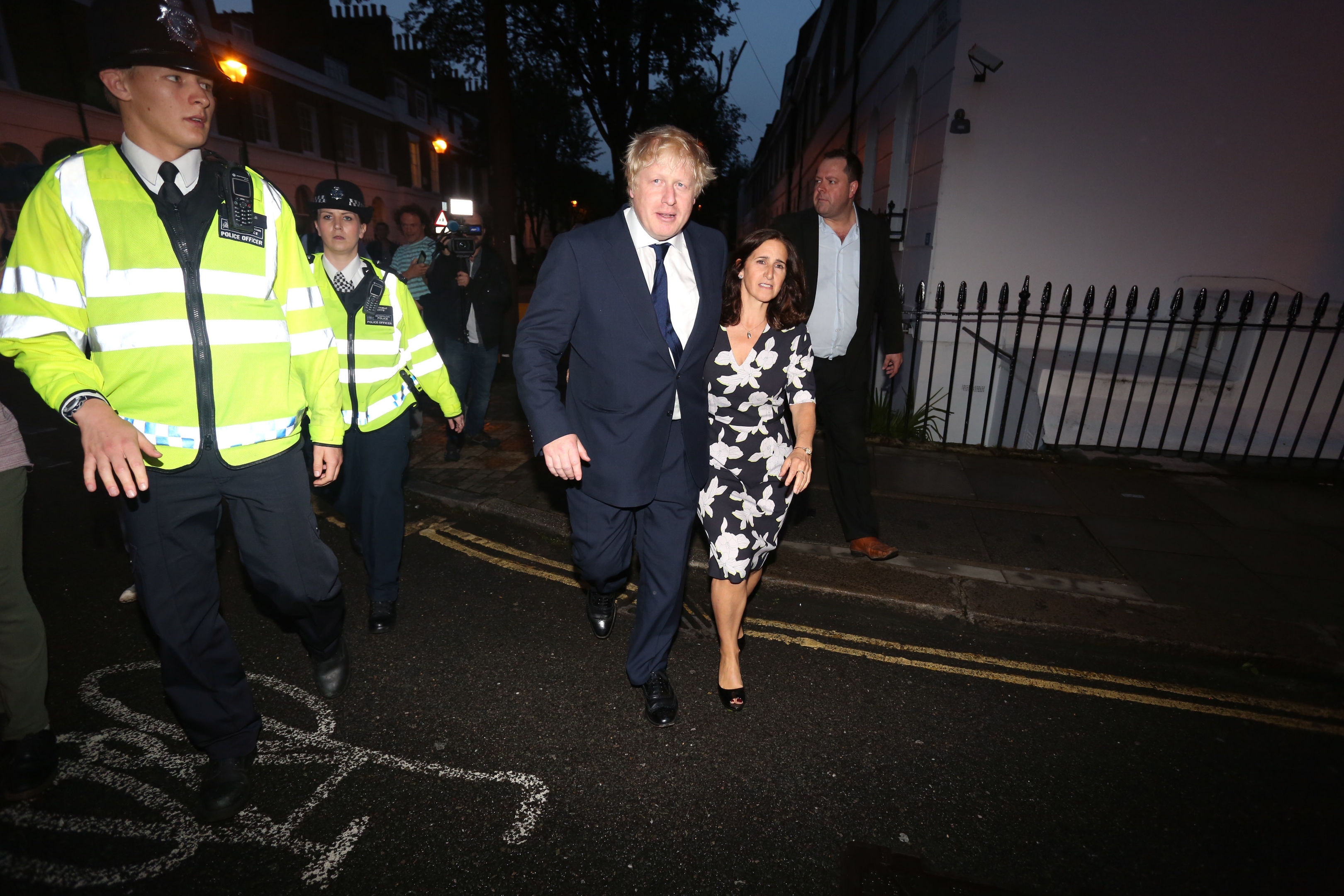 Boris Johnson and his wife Marina leave after casting their votes