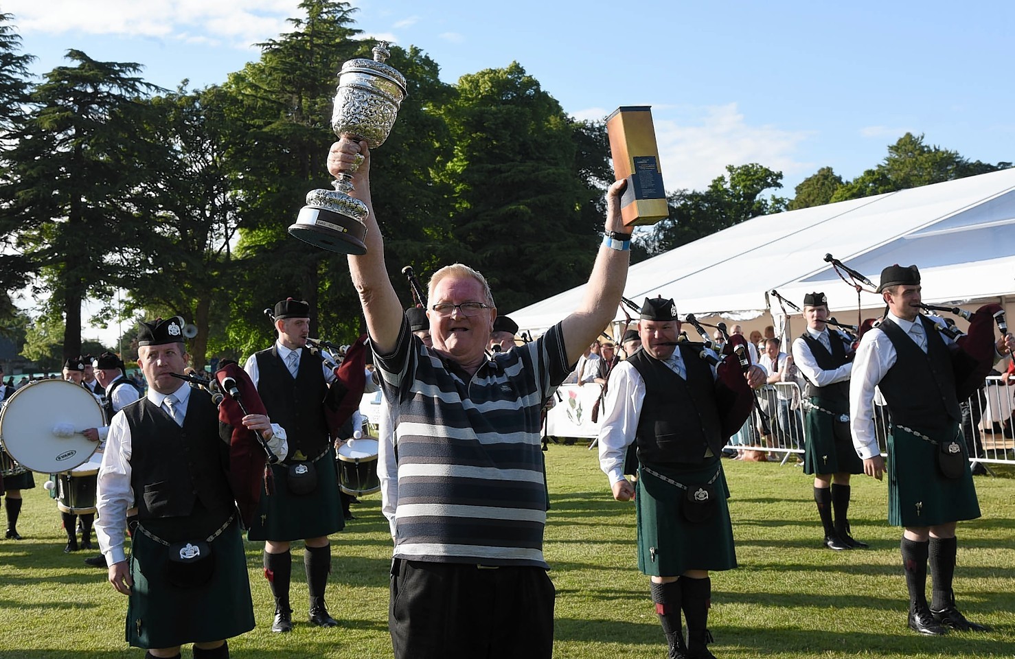 The European Championship trophy is paraded before the St Lawrence O'Toole Pipe Band from Dublin.