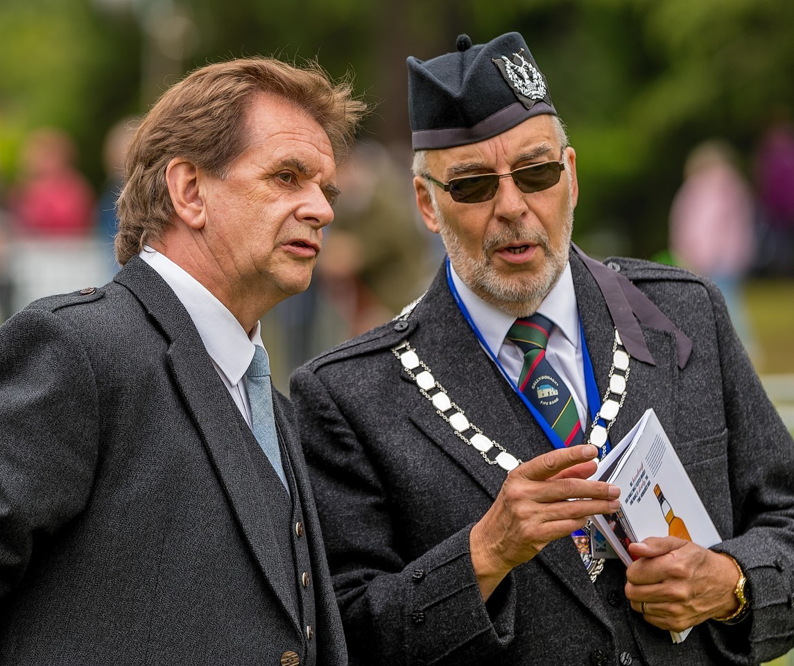 George Ussher (President of Royal Scottish Pipe Band Association with Donnie Munro Chieftain of Piping at Forres.