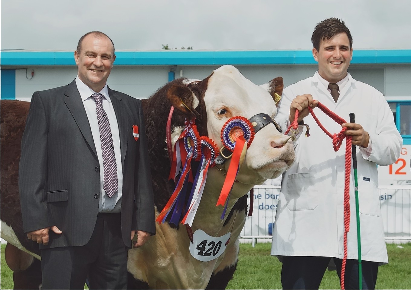 Gerald Smith with Will Livesey and his champion Hereford bull