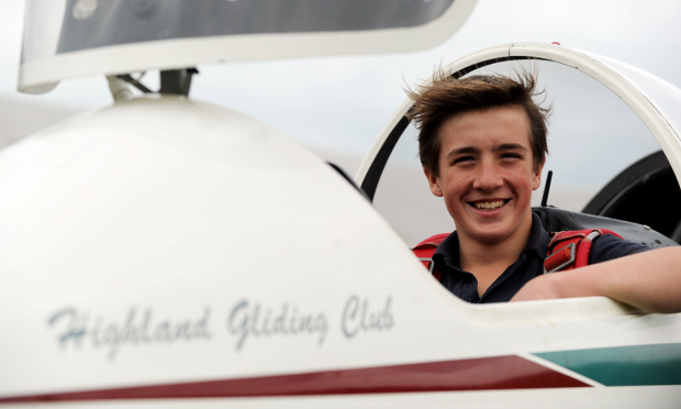 14-year-old Ruari Tait, at Highland Gliding Club, Birnie, after completing his first solo glider flight.
Picture by Gordon Lennox