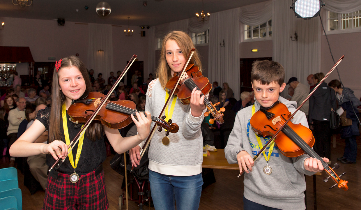 The top three from the under 12 fiddle class. Pictured: Rachel Haulin, Rhiann Matthew, Calum Shepherd.