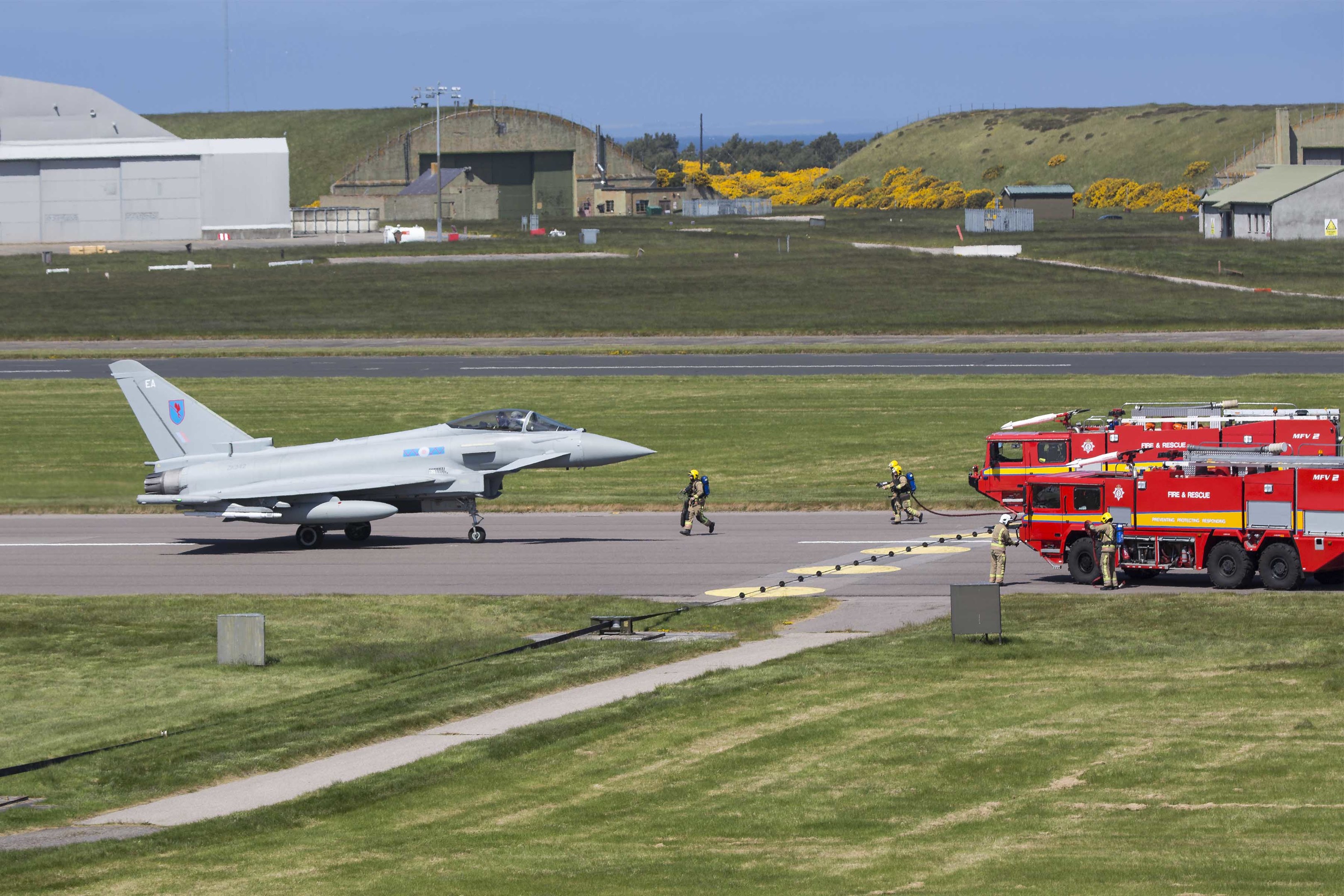 The Typhoon jet was met by fire engines after it landed at Kinloss.