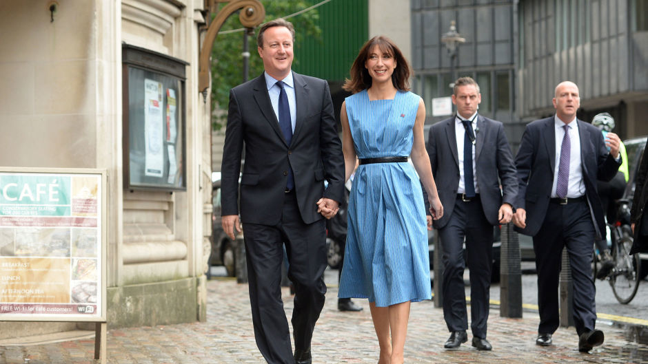 Prime Minister David Cameron and wife Samantha arrive to cast their votes at a polling station in Westminster, London