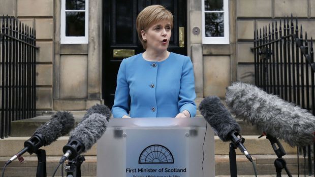 First Minister Nicola Sturgeon speaks to the media outside Bute House
