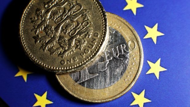 The financial shockwaves of the Brexit vote have begun to reverberate as the outlook on Britain's credit rating was downgraded