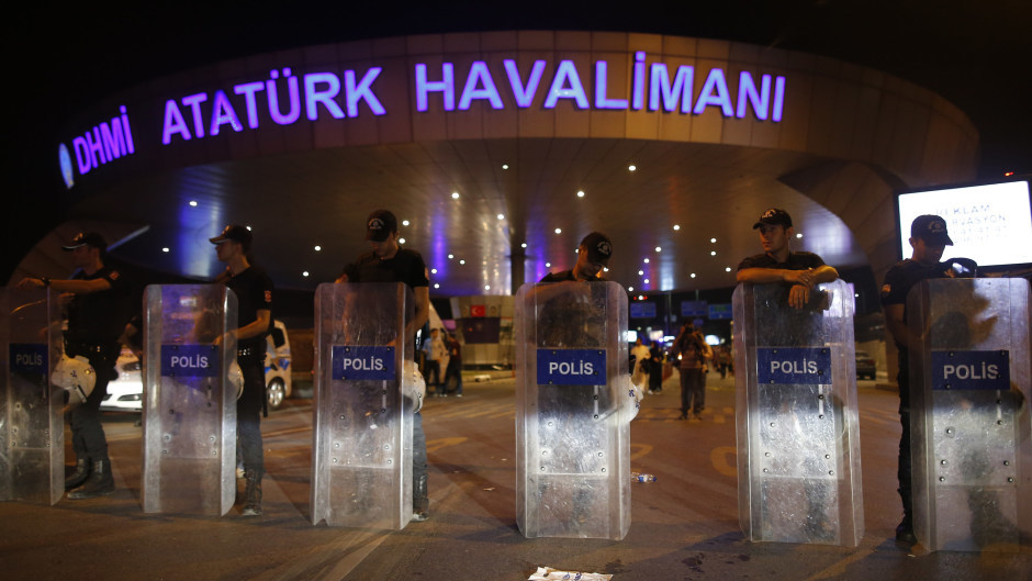Turkish police block the entrance to Istanbul's Ataturk Airport after the attack (AP)