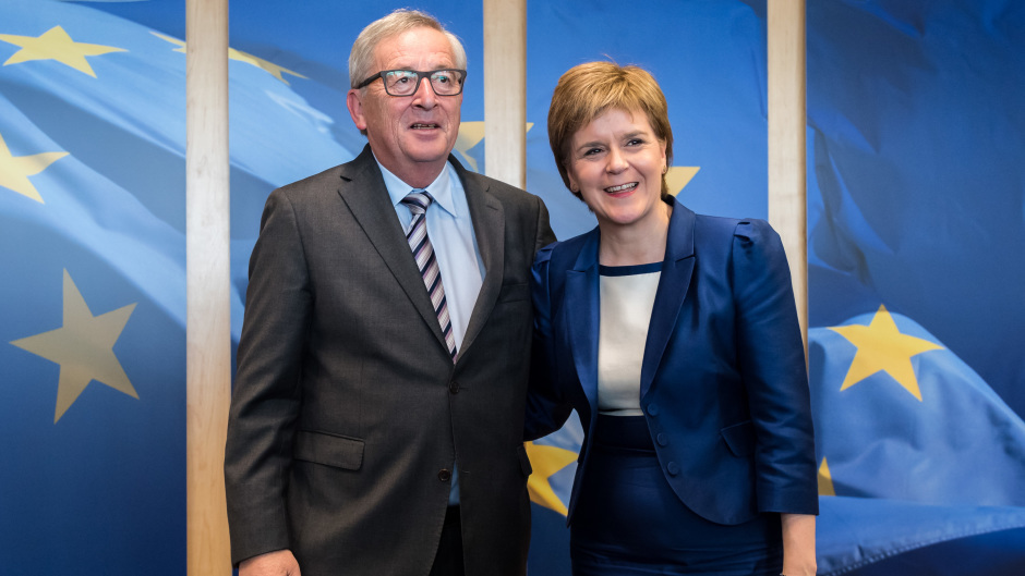 European Commission President Jean-Claude Juncker greets Nicola Sturgeon upon her arrival at his office at EU headquarters in Brussels (AP)