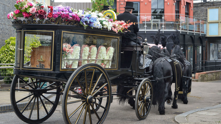 Peggy Mitchell's funeral procession in Albert Square (BBC/PA)