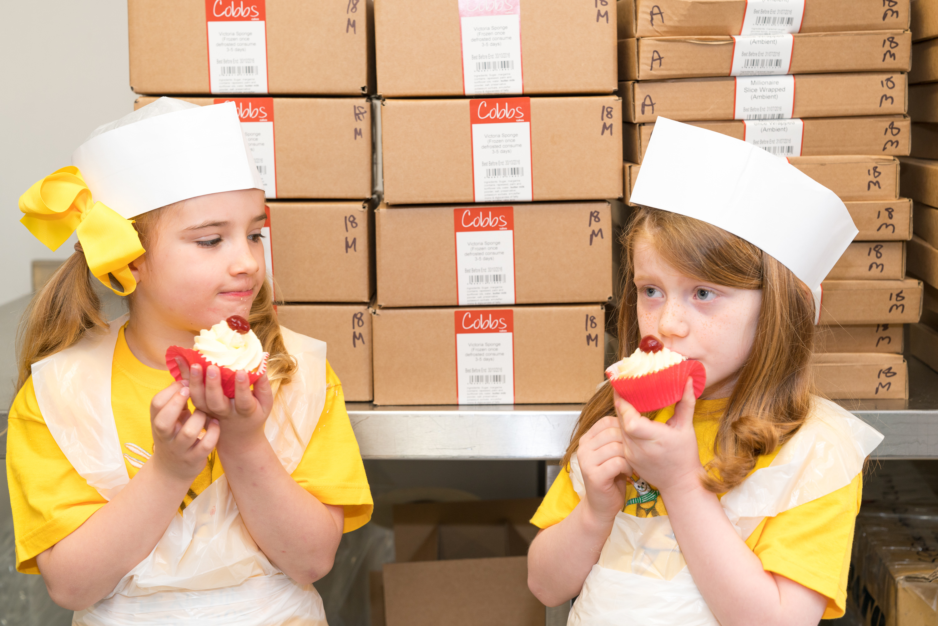 Amy MacKintosh and Amy Smith sampling some cakes for ARCHIE at Cobbs bakery.