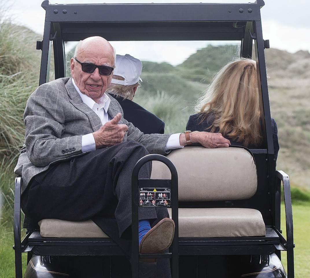 Rupert Murdoch, Jerry Hall and Donald Trump at his north-east golf course